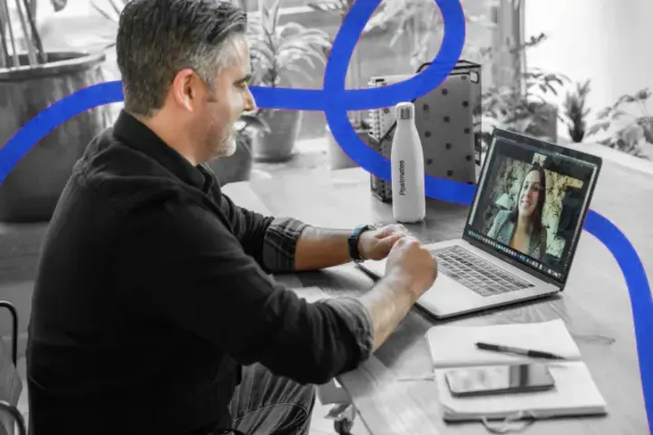A man on a video call on his laptop